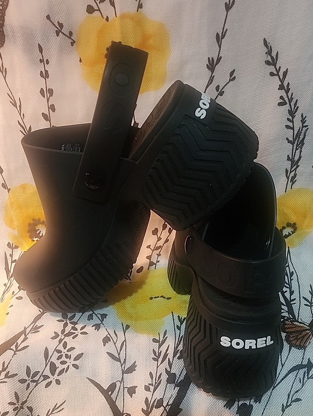 Sorel Black Slip-On Clog Sandals with Heel Strap